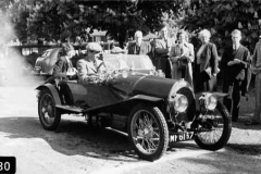 230. 8 Valve, Chassis # 765, Reg. MF Photo No: 230 Negative No: D1047_29 Chassis No: 765 Reg: MF 6167 People: Peter Hampton Album: 026167 Peter Hampton with car.