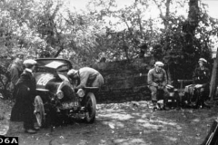 106A. Reg. VIA 1621 Friderich seated, could be Meo Costantini & mechanic Soderini with car?